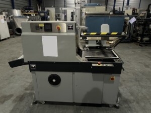 Scelleuse avec four de rétraction